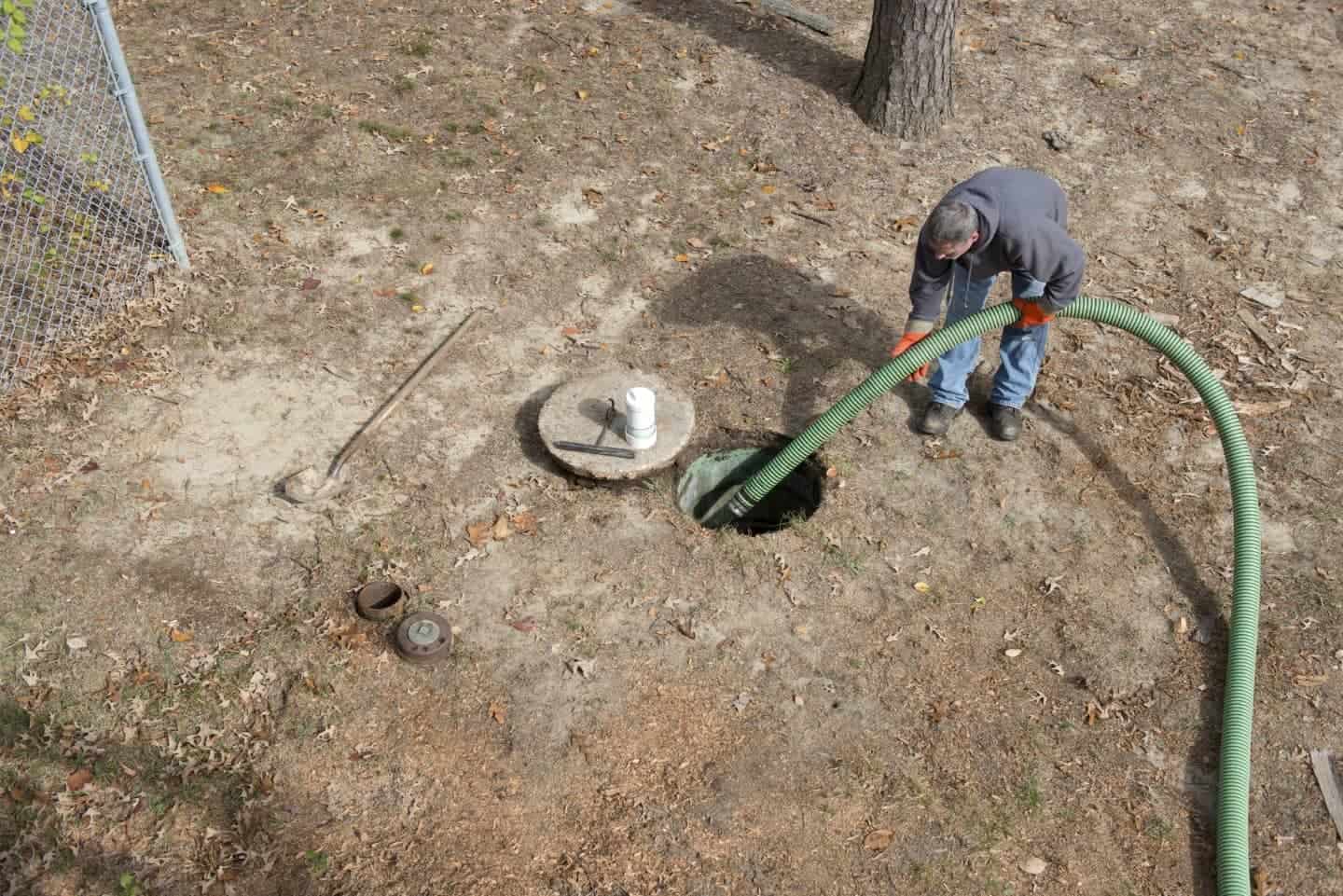 Man Cleans Home Septic Tank